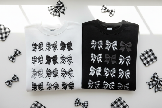 Checkered Bows sweatshirts folded flat lay white and black
