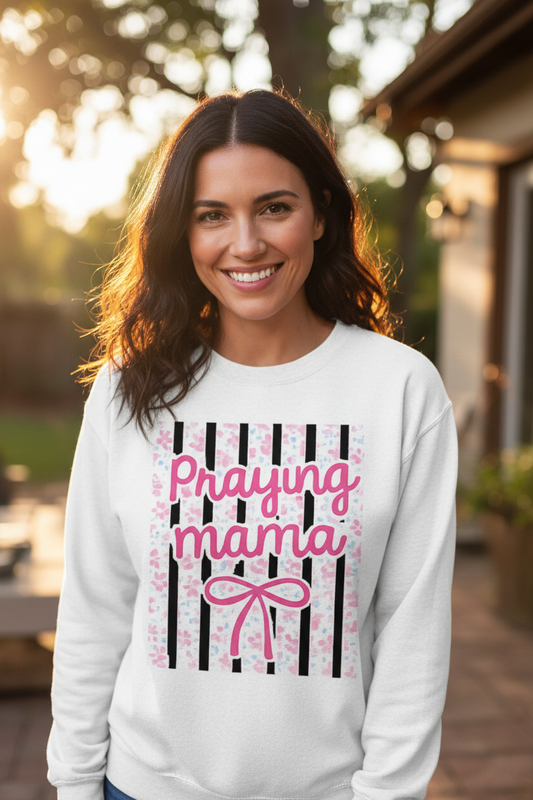 Woman wearing Praying Mama crewneck sweatshirt lifestyle shot